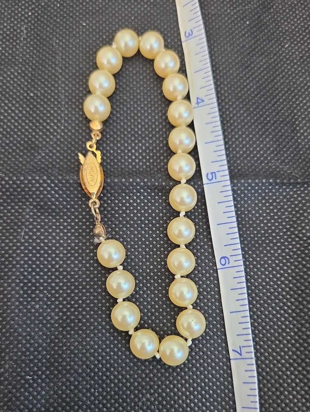 Classic Faux Pearl Bracelet in Cream with Gold Clasp By Avon.
